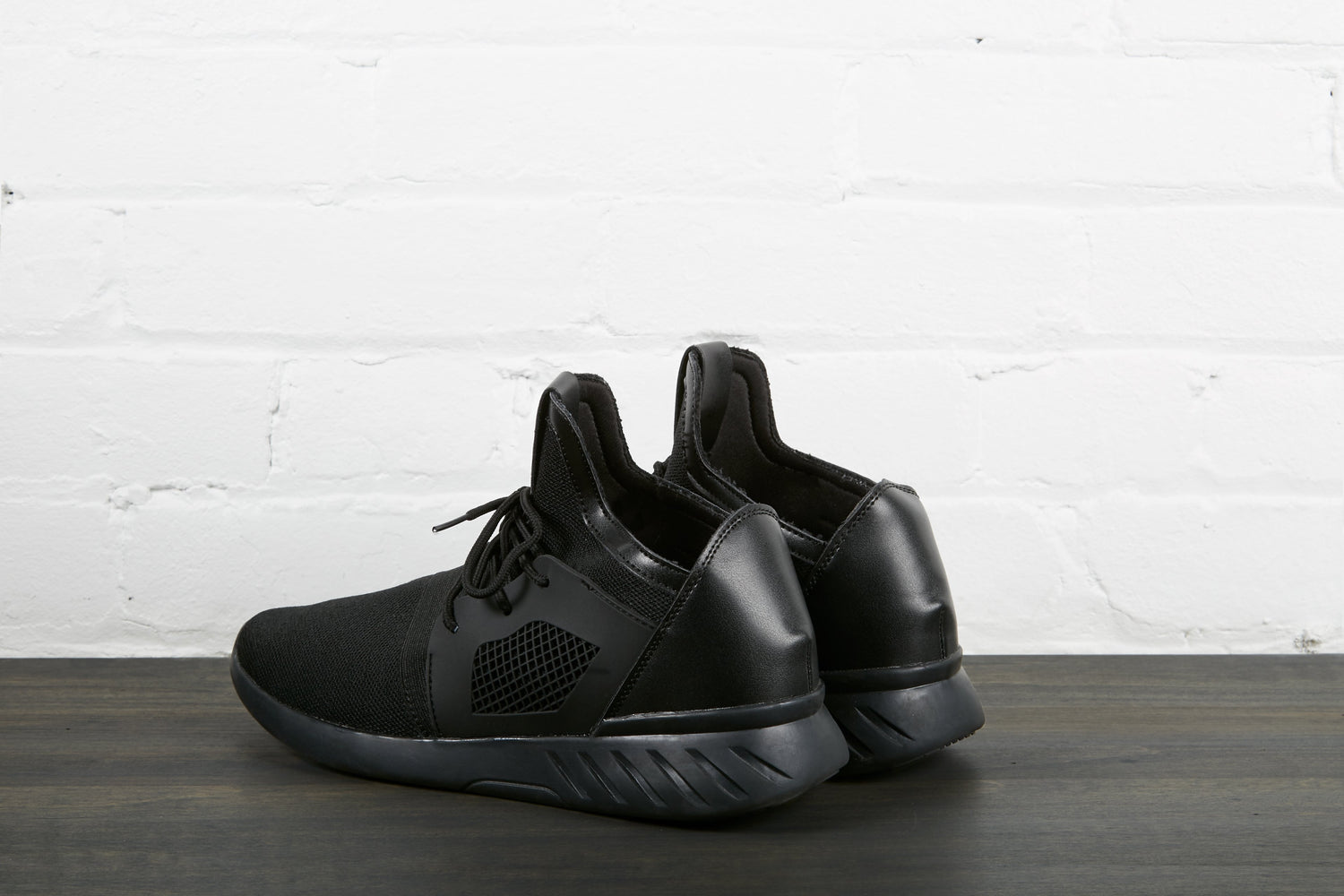 Pair Of Black Sneakers Back - Sillycube Demo Shop
